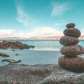 gray rocks on seashore during daytime